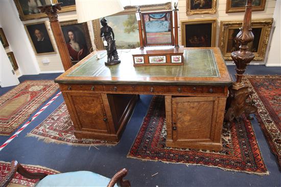 A Victorian brass bound pollard oak partners desk, W.5ft 3in. D.3ft H.2ft 6in.